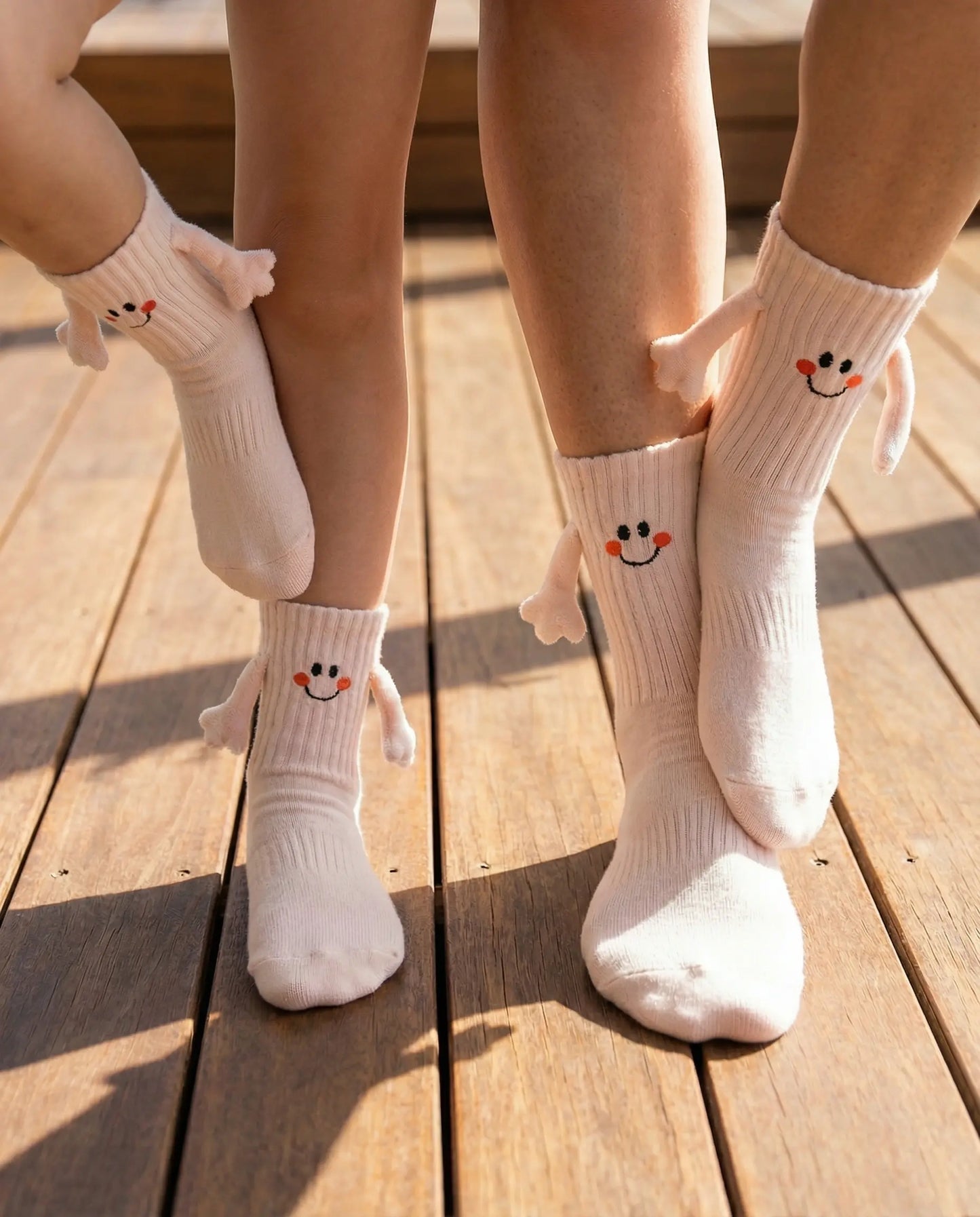 Tryon of magnetic smiley face family crew sock in beige colour at the deck