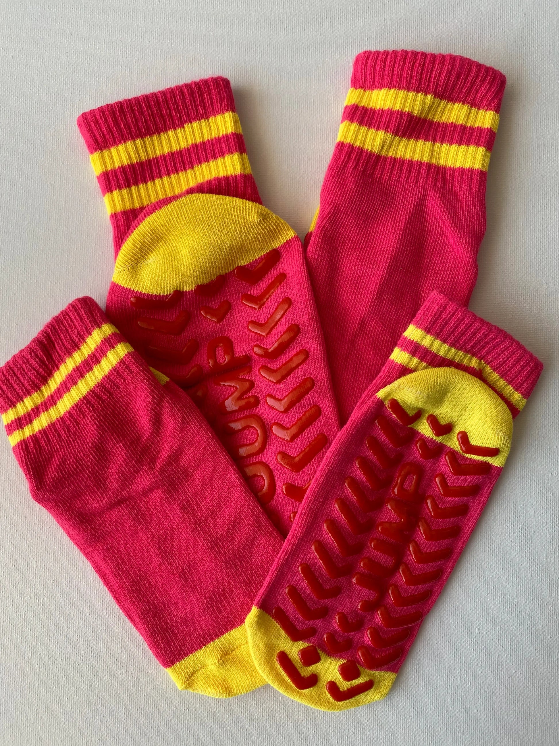 Closeup of bold jump family grip sock in pink colour entire set