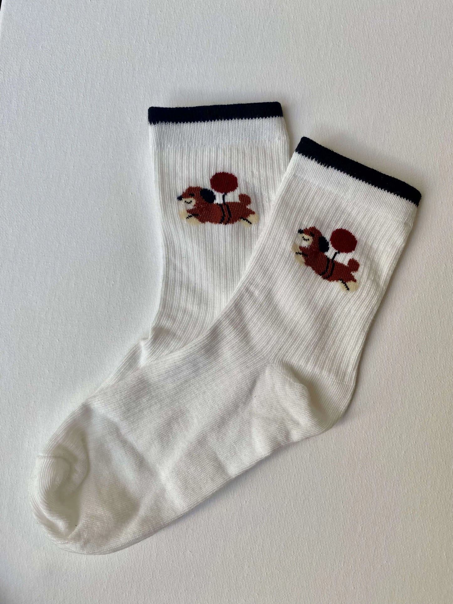 Product image of dachshund with balloon crew sock by Sock the Luck up AU