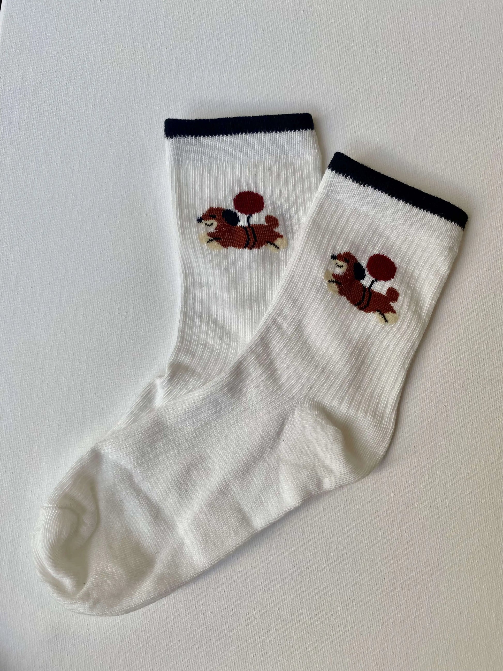 Product image of dachshund with balloon crew sock by Sock the Luck up AU