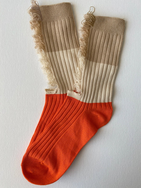 Product image of ripped unisex crew sock in cream and orange colour by Sock the Luck up AU