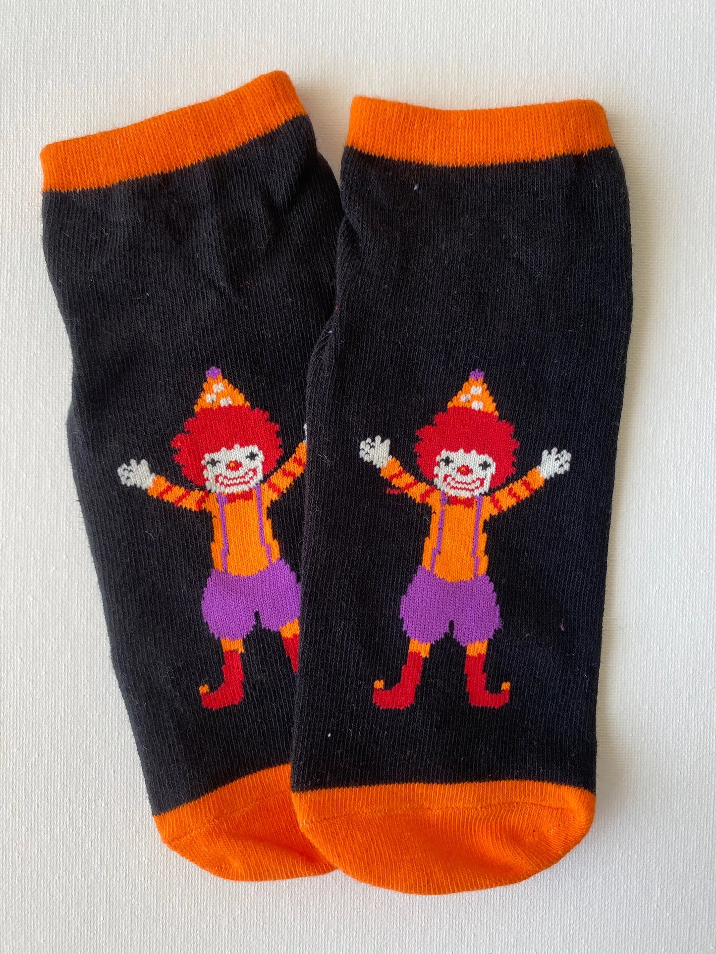 Product image of silly clown family grip sock in orange colour adult size by Sock the Luck up AU