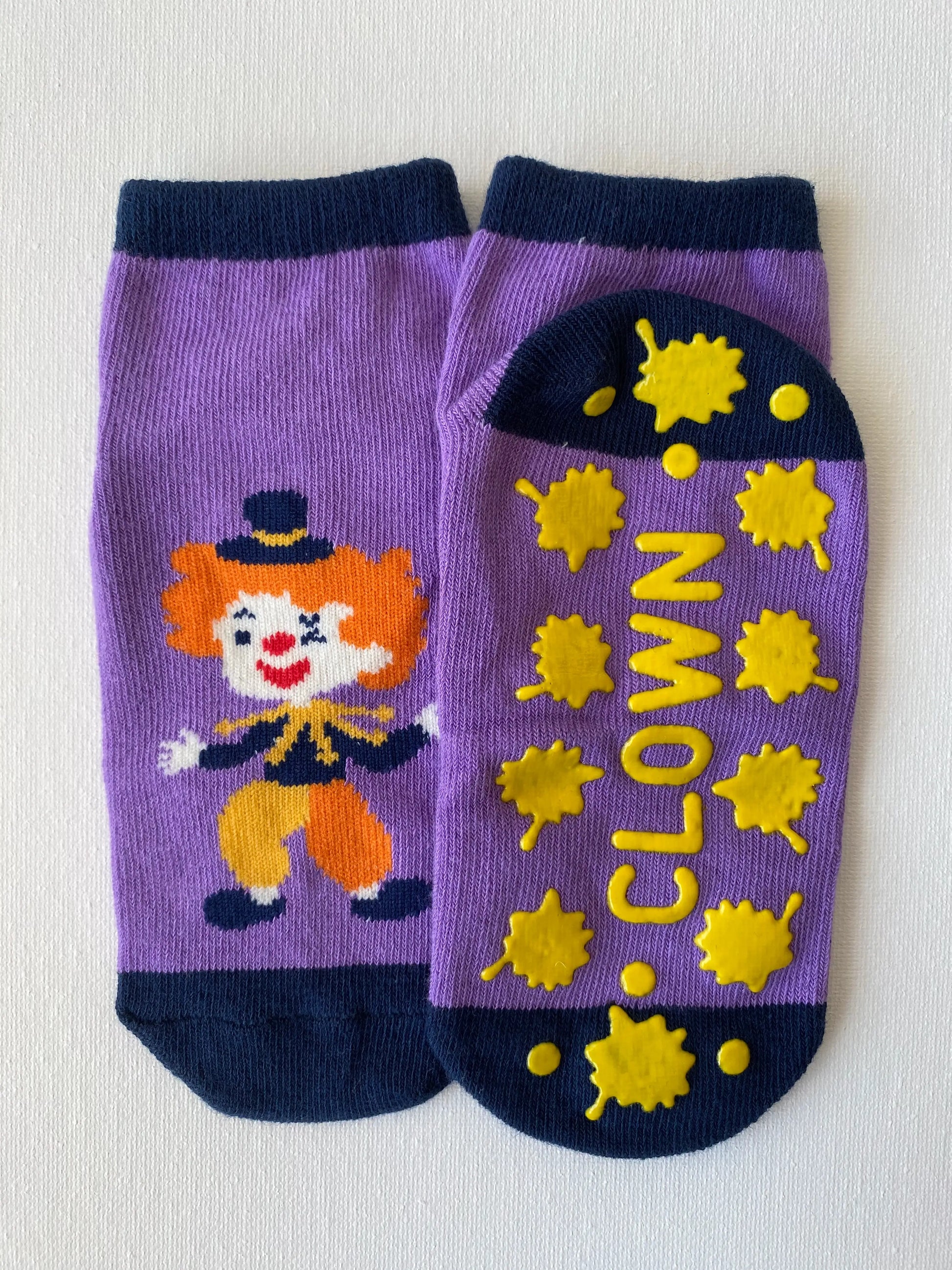 Product image of silly clown family grip sock in purple colour kid size front and back view