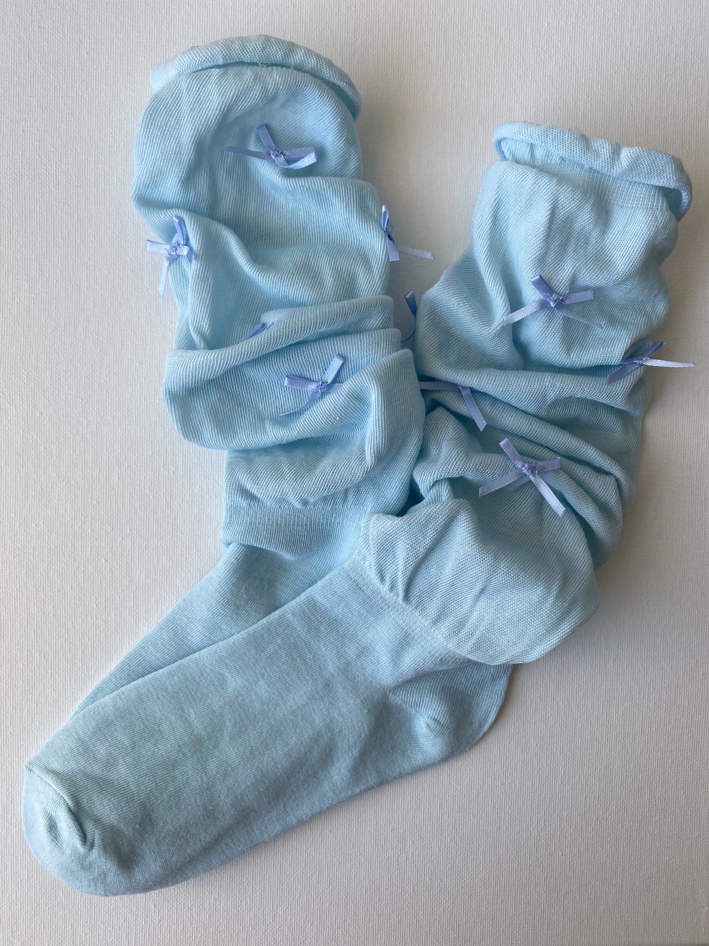 Product image of slouched bow mid calf crew sock in dusty blue colour by Sock the Luck up AU