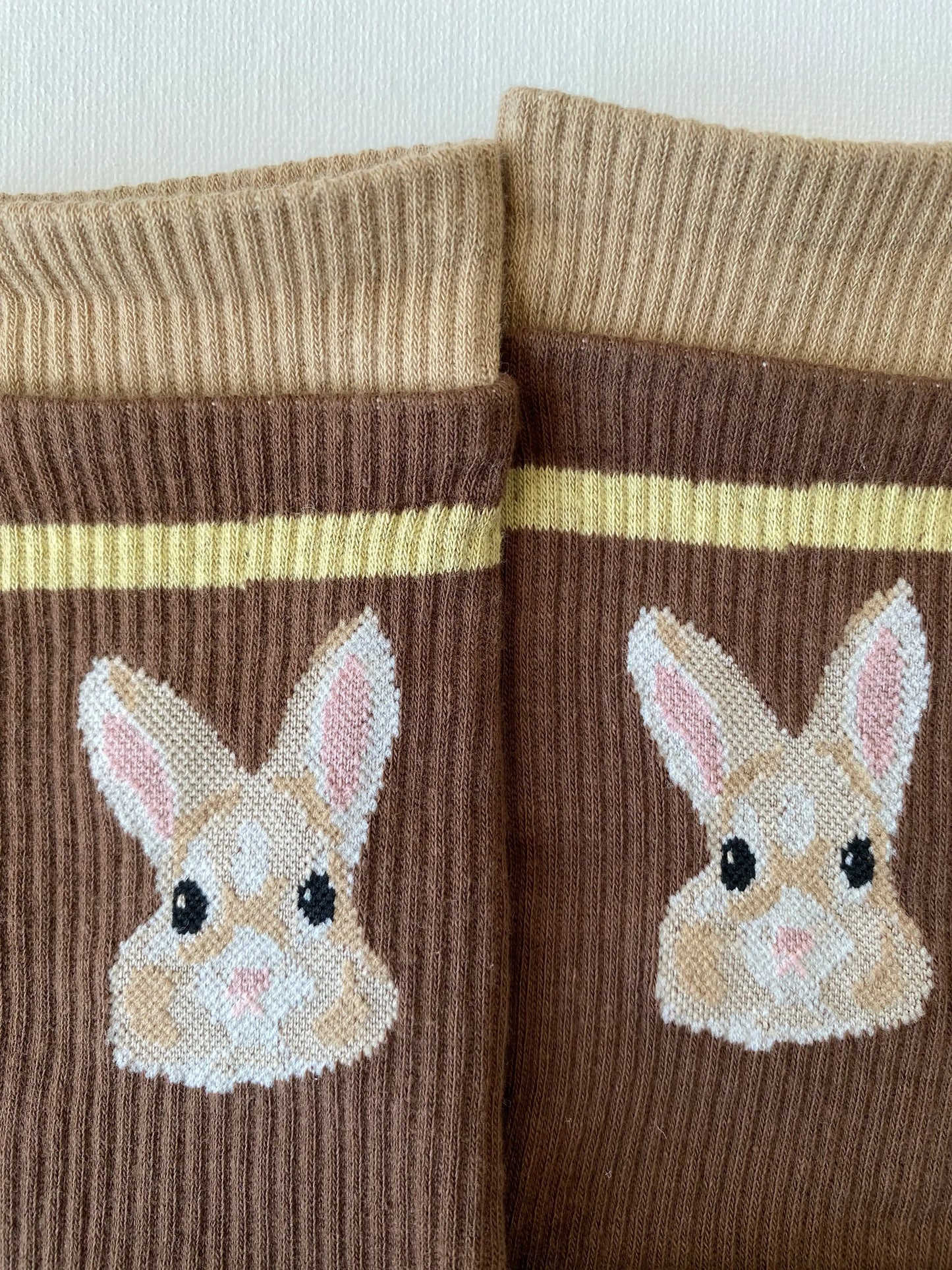 Closeup of tiptoe animal grip toe sock rabbit motif cuff details 