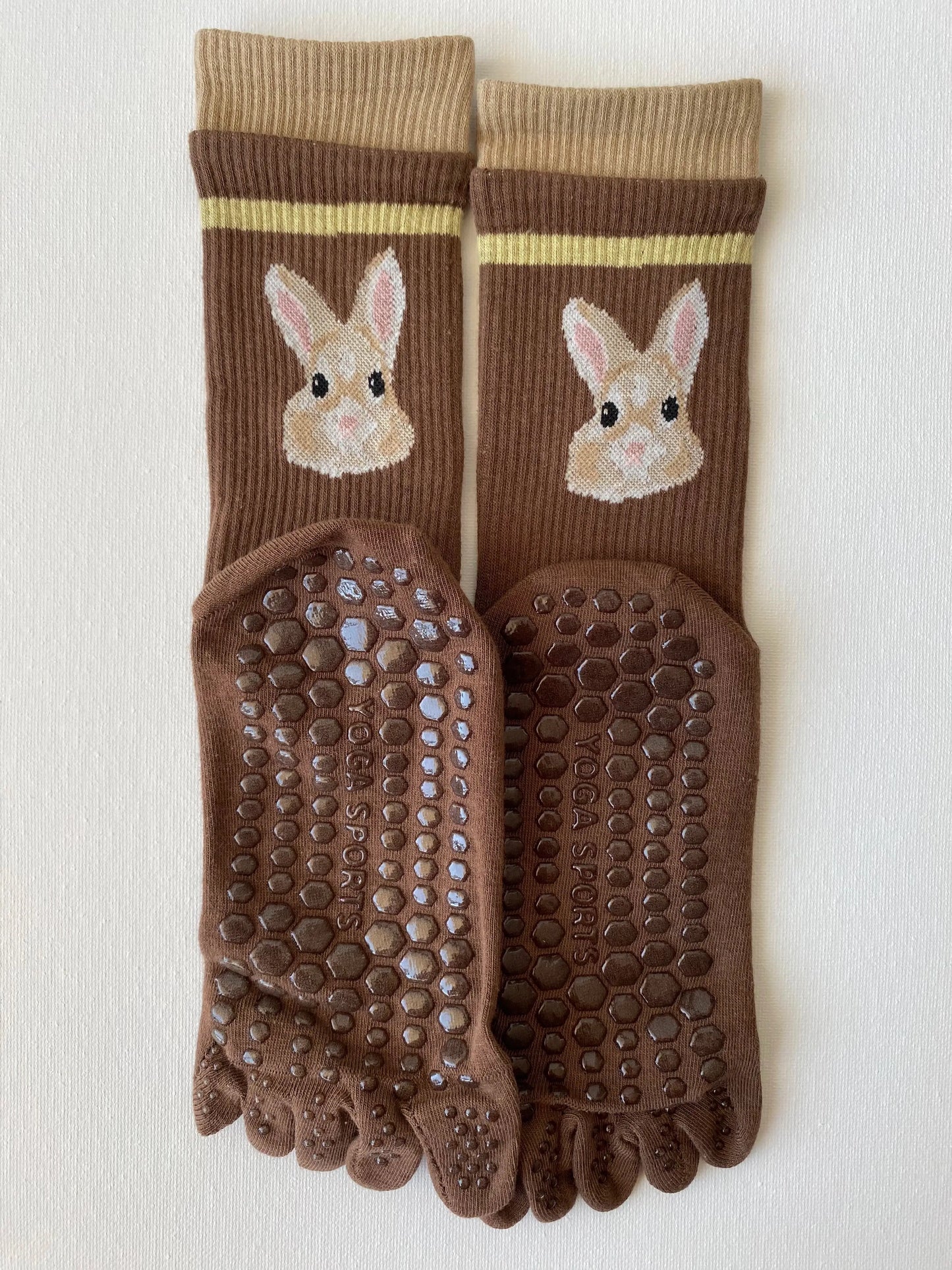 Product image of tiptoe animal grip toe sock in brown colour with a rabbit motif by Sock the Luck up AU